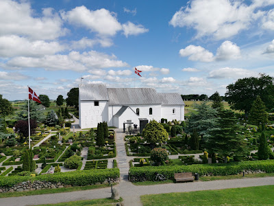Jelling Mounds, Runic Stones and Church