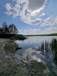 Beach and a place for a campfire at the Stolsko Lake