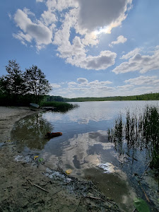 Beach and a place for a campfire at the Stolsko Lake